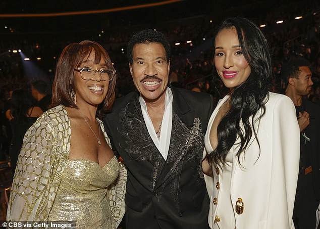 Gayle King, Lionel and Lisa Parigi smiled for the cameras