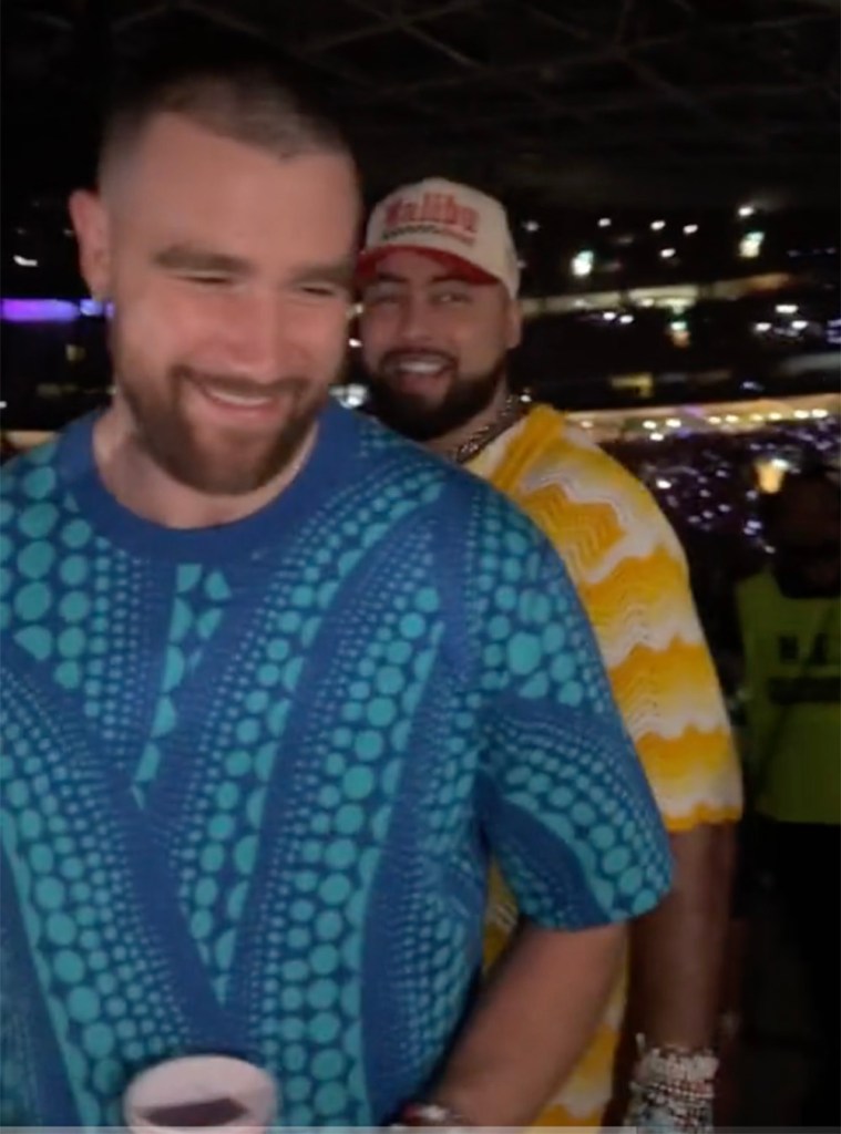 Travis Kelce and Ross Travis interacting with fans at Taylor Swift's show in Sydney, Australia on Friday, February 23, 2024.