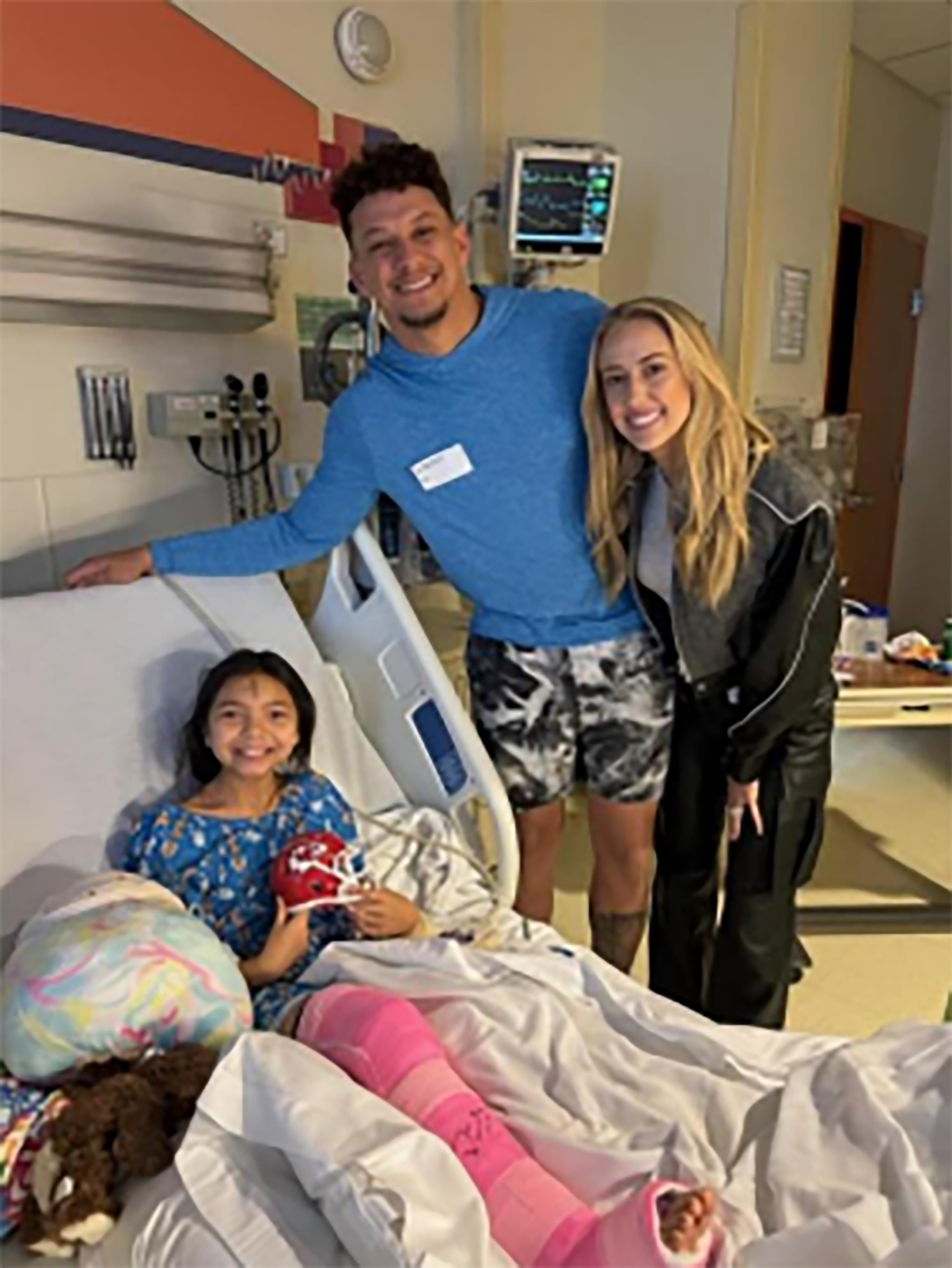 PHOTO: Patrick and Brittany Mahomes visited kids injured in the Chiefs parade shooting.