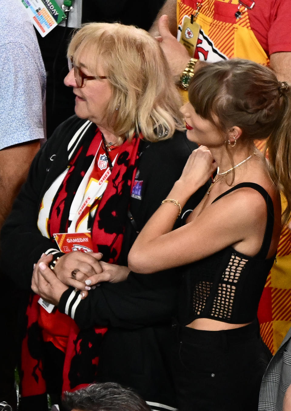 US singer-songwriter Taylor Swift and Donna Kelce stand on the field after Super Bowl LVIII between the Kansas City Chiefs and the San Francisco 49ers at Allegiant Stadium in Las Vegas, Nevada, February 11, 2024. (Photo by Patrick T. Fallon / AFP) (Photo by PATRICK T. FALLON/AFP via Getty Images)