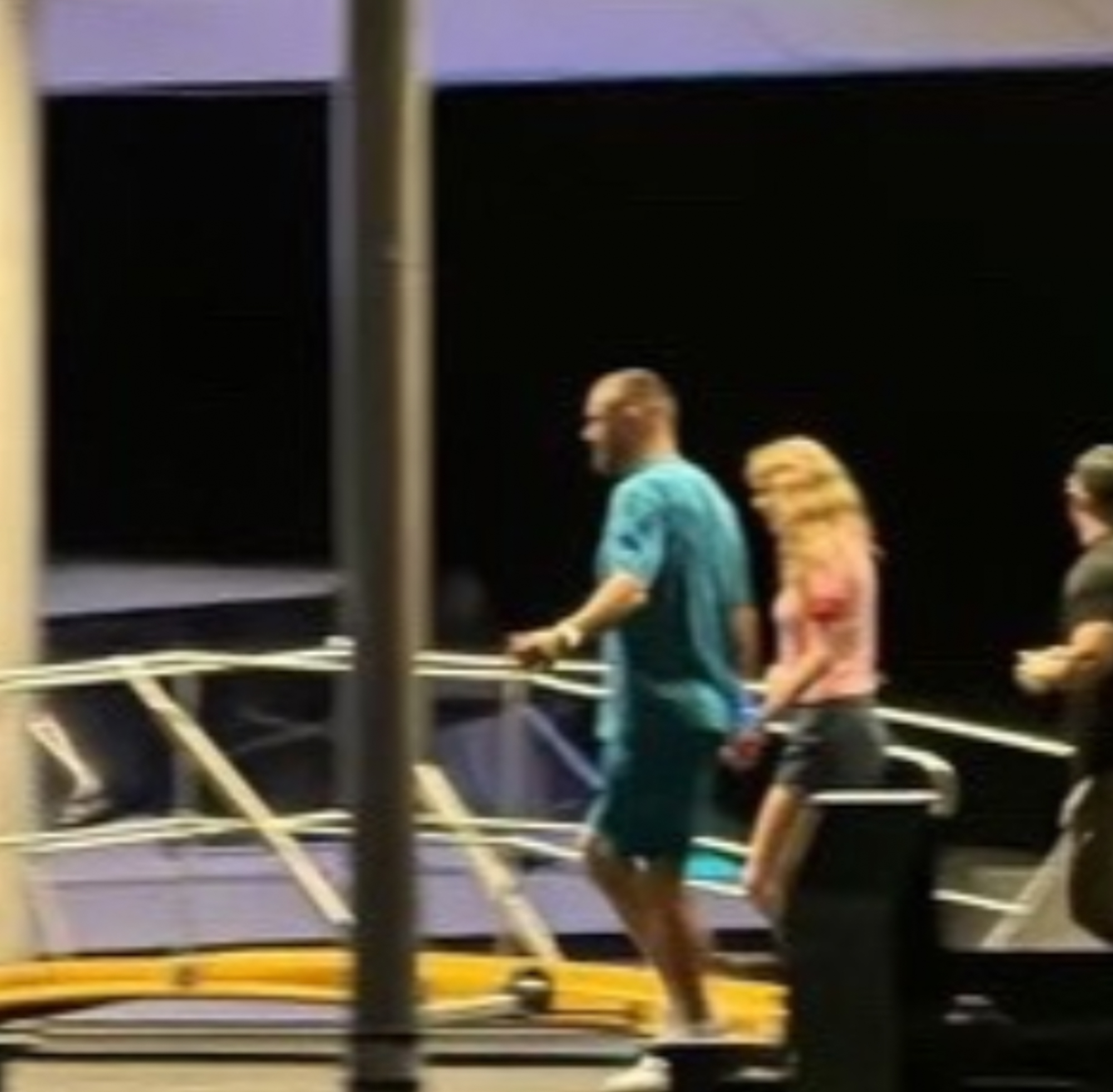 Taylor Swift and Travis Kelce holding hands