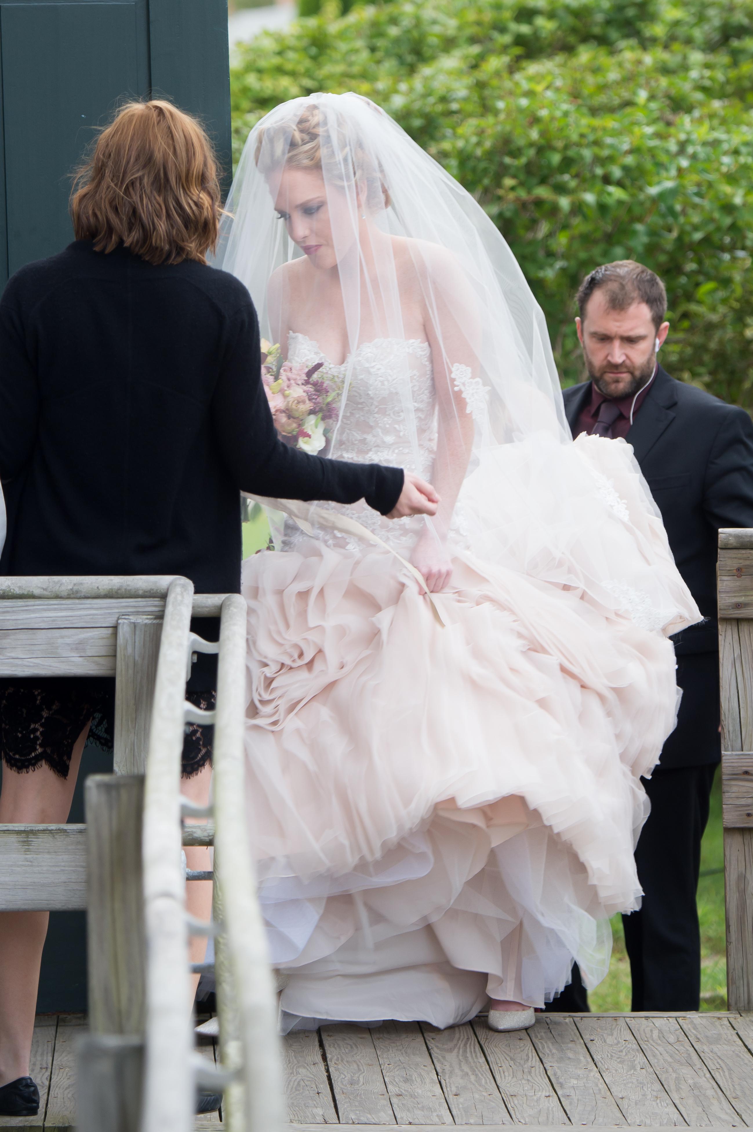 Abigail looked beautiful in an off-white and light pink gown which featured a sweetheart neckline and a flared out tulle skirt