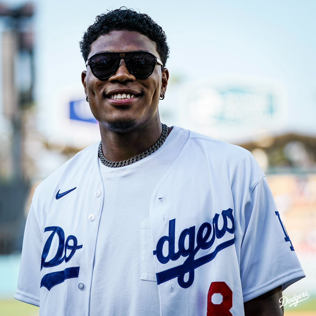 Rui Hachimura at a baseball game with the LA Dodgers, surrounded by family joy to welcome Shohei Ohtani