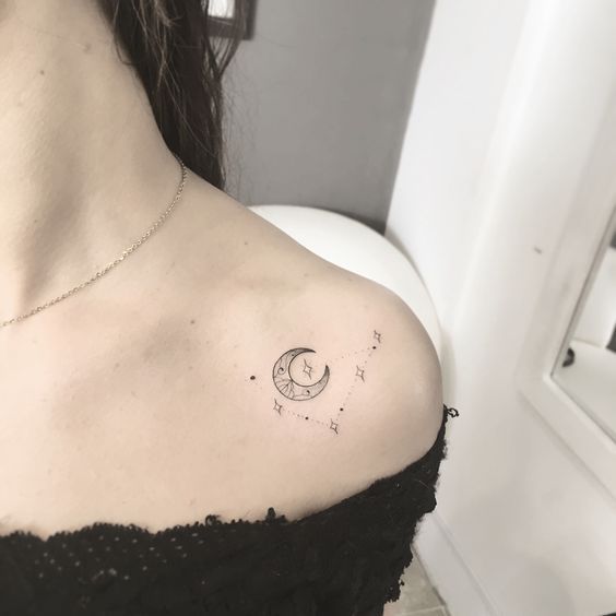 Capricorn constellation and moon tattoo on the shoulder