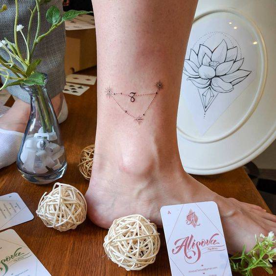 Capricornus constellation tattoo located on the ankle