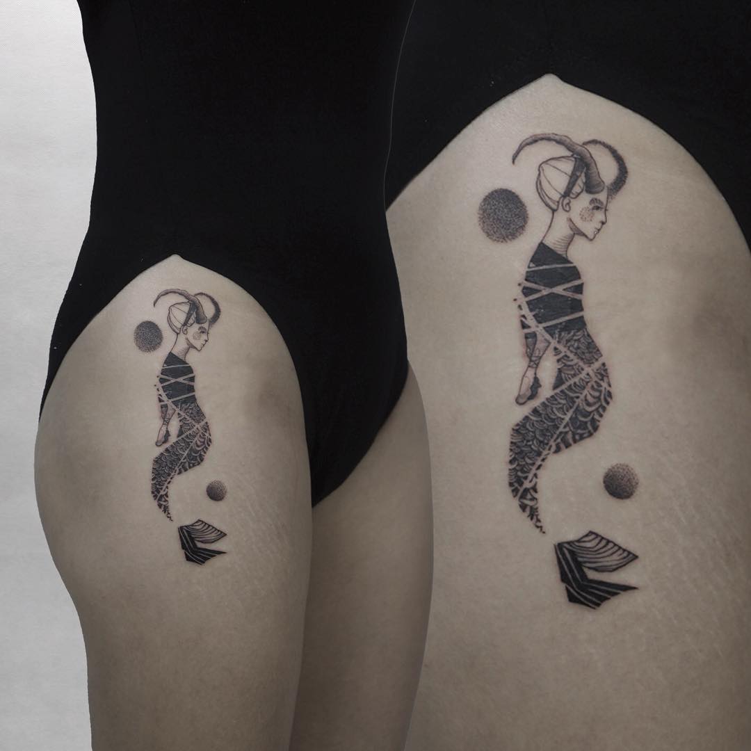 Lady sea goat tattooed on the hip