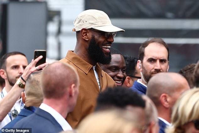 The 38-year-old towered over the crowd gathered near the start line on Saturday