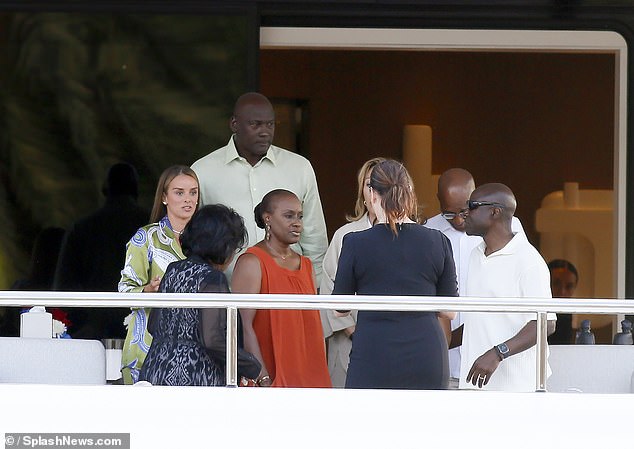 Jordan and Prieto are on a family vacation in Barcelona with Jordan's mom Deloris (bottom left), brothers James Jr (second from right) and Larry (right) and sister Roslyn (third from left)