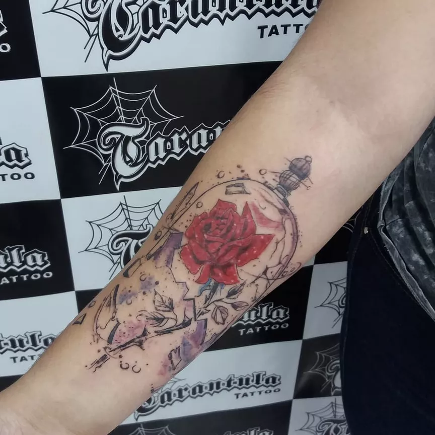 Glass-Encased Rose Forearm Tattoo