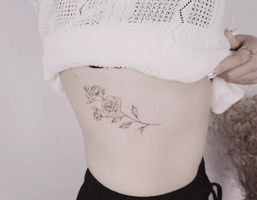 Super Delicate Ribcage Rose Tattoo