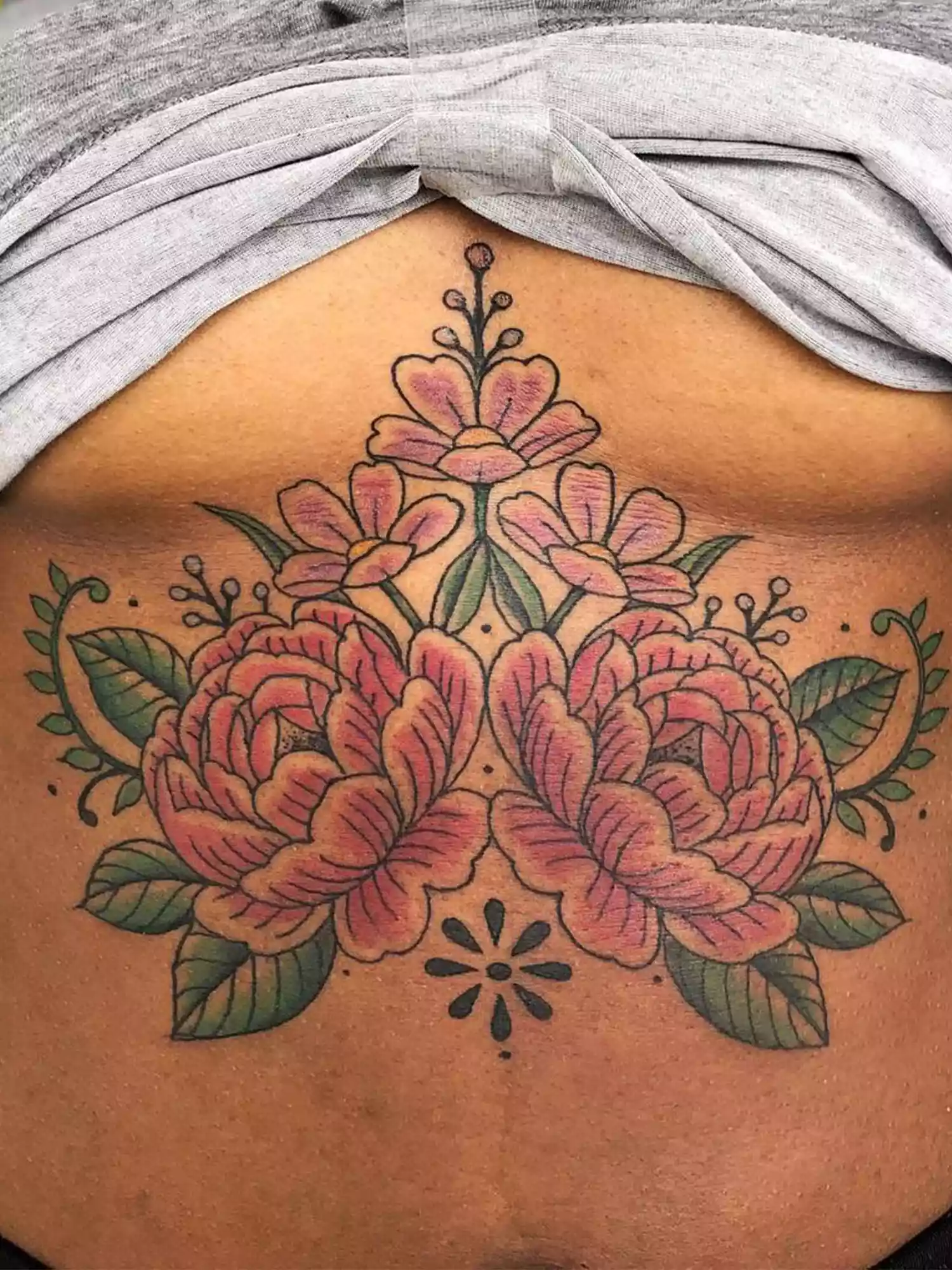 floral tattoo on chest