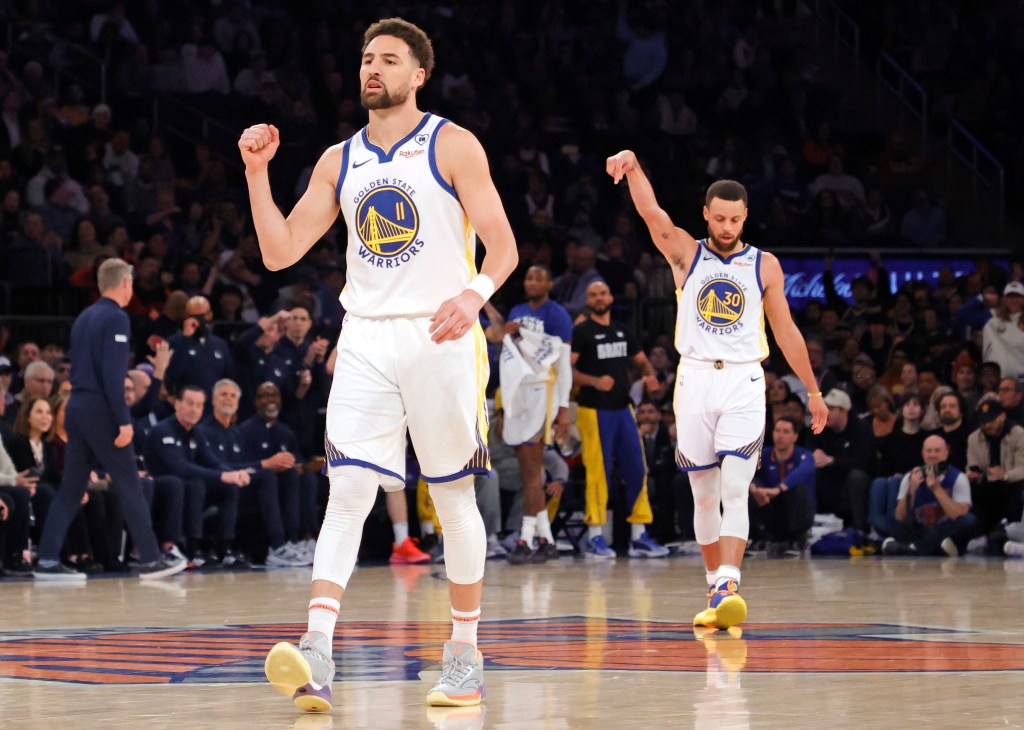 Warriors guard Klay Thompson and Warriors guard Stephen Curry react after scoring during the first quarter against the Knicks on February, 29, 2024.  
