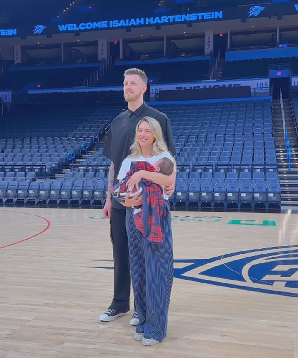 Isaiah Hartenstein and his wife Kourtney Kellar with their son on his signing day at Paycom Center in OKC.