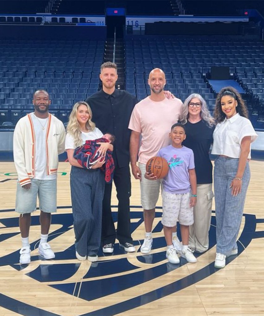 Isaiah Hartenstein and his wife Kourtney Kellar with his family on his signing day at Paycom Center in OKC.