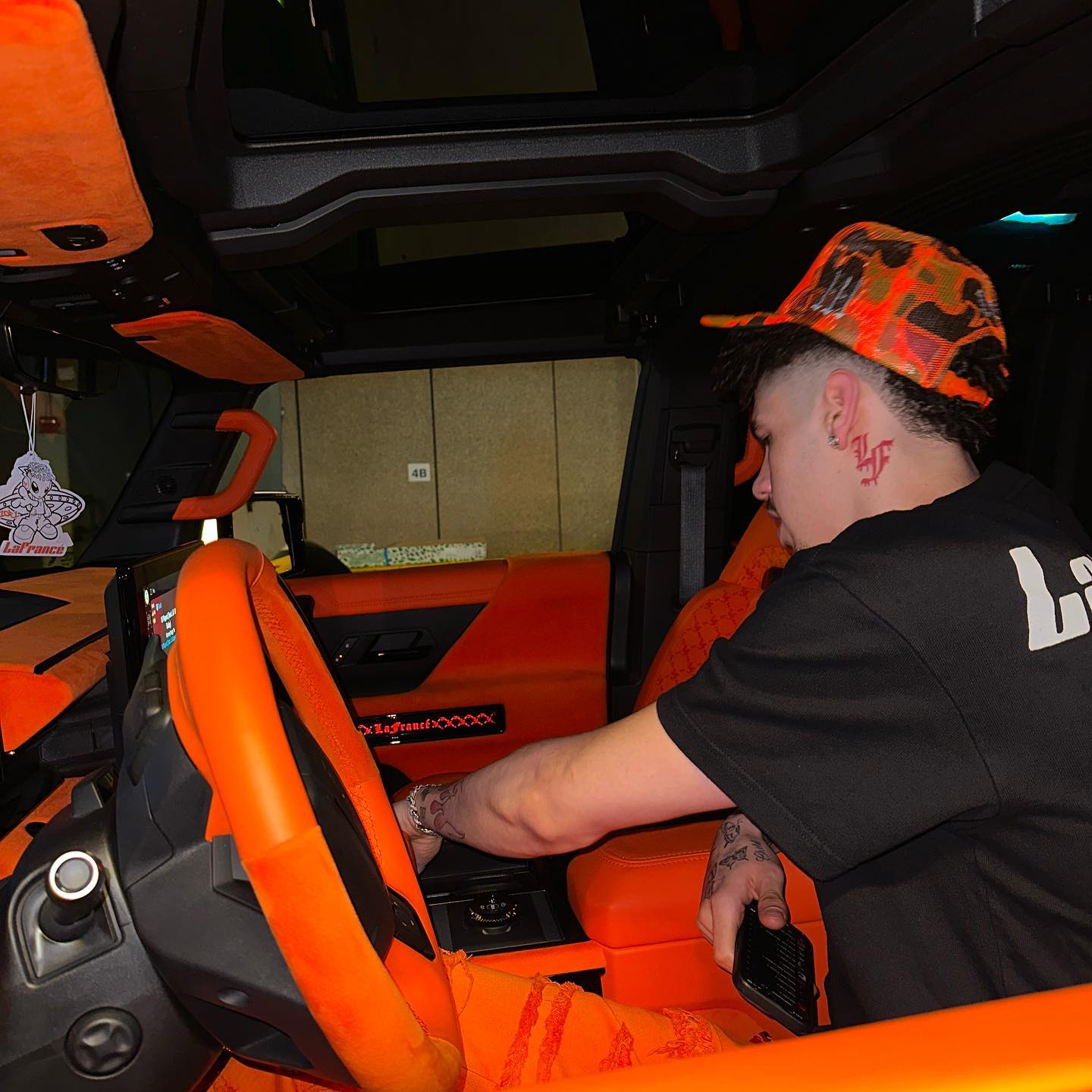 The car has an outrageous orange interior