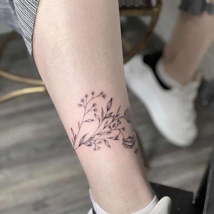 flower ankle tattoo