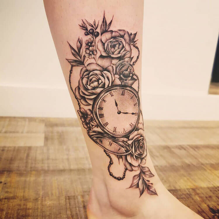 clock with flowers on leg