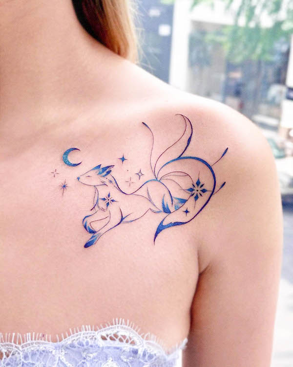 Blue fox shoulder tattoo by @e.hyang_.tattoo