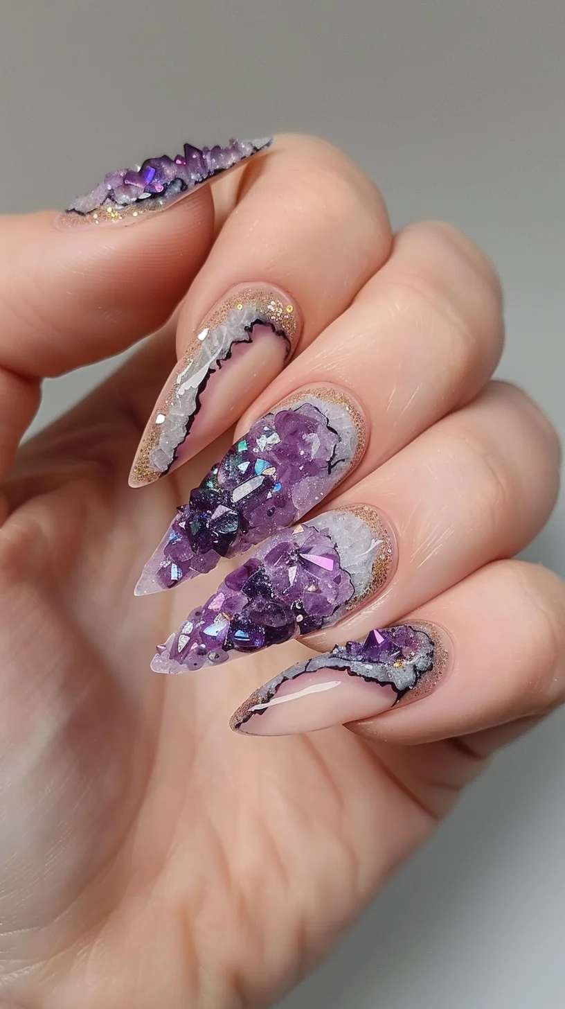 This design showcases a stunning depth of detail, featuring layers of amethyst purple and shimmering silver. The crystals are intricately layered and enhanced with sparkling gem-like embellishments that catch the light beautifully. The rugged, uneven texture at the tips mimics the natural roughness of geode edges, while subtle gold glitter along the cuticle line adds a luxurious touch.