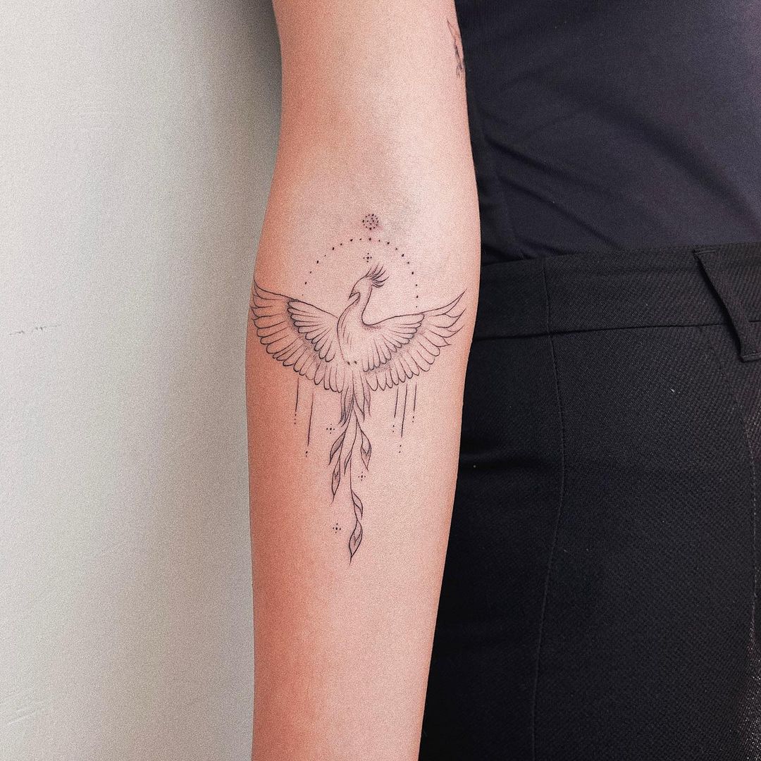 Minimalist Rising Phoenix Tattoo