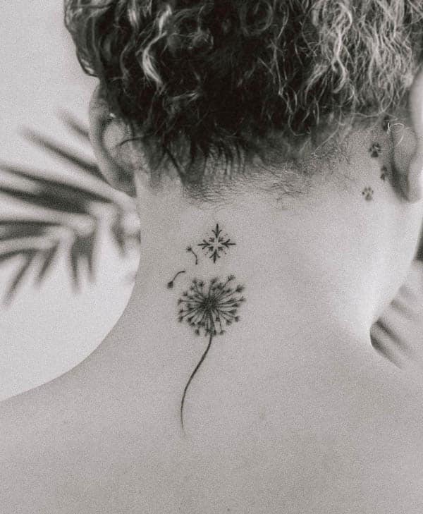 Dandelion and snowflake neck tattoo by @ghazal_jafari_tattoo_art