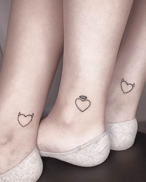 Devil and angel hearts matching foot tattoos by @tgart_tattoo