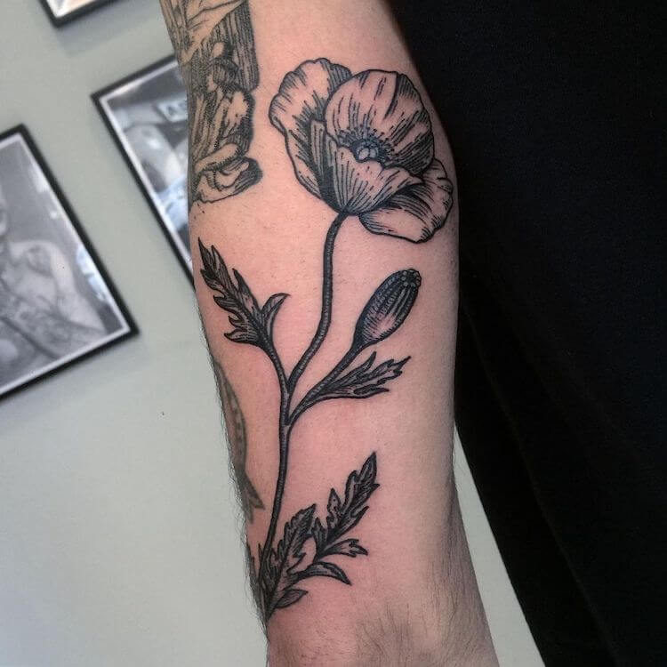 black and white poppy flower tattoo