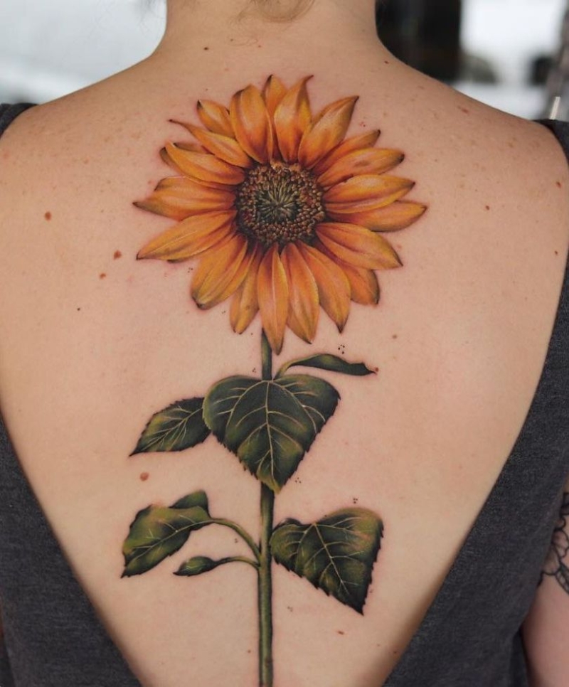 floral spine tattoo