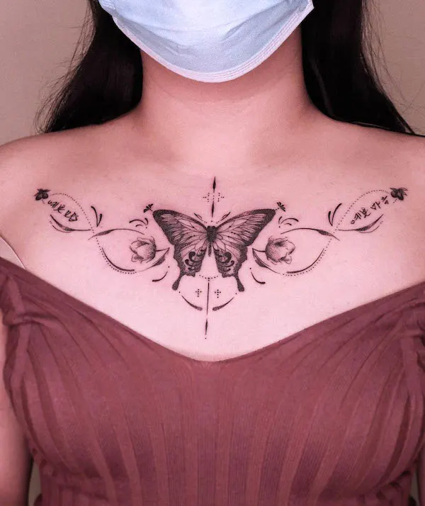 Black and grey butterfly chest tattoo by @cocotattooer