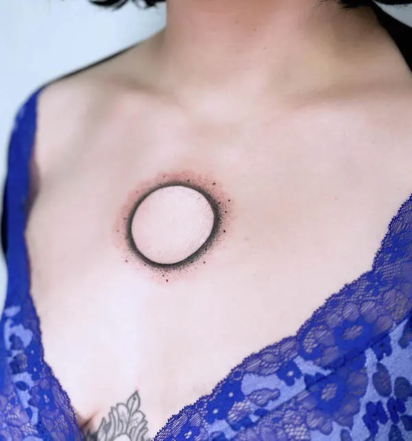 Circle middle chest tattoo by @keirra.tattoos