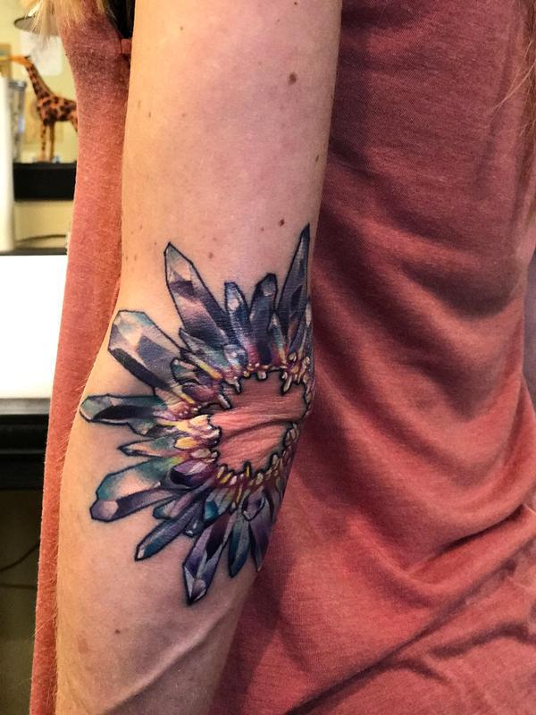 Crystal elbow tattoo