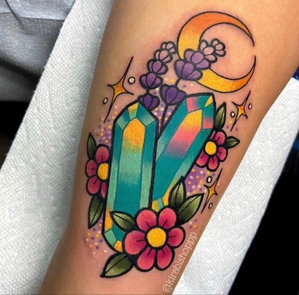 Crystal with flowers and crescent moon tattoo