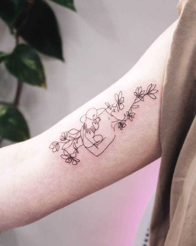 Flowers and vine mom tattoo by @pionobedrist