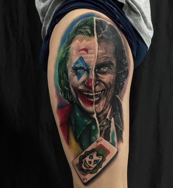 Joker and card thigh tattoo