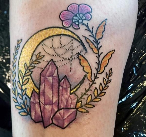 Pink crystal and crescent moon with ferns and flower tattoo