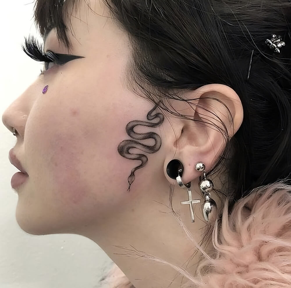 Snake Ear Tattoo