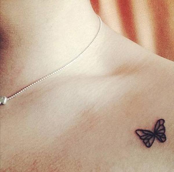 Fine line butterfly collarbone tattoo