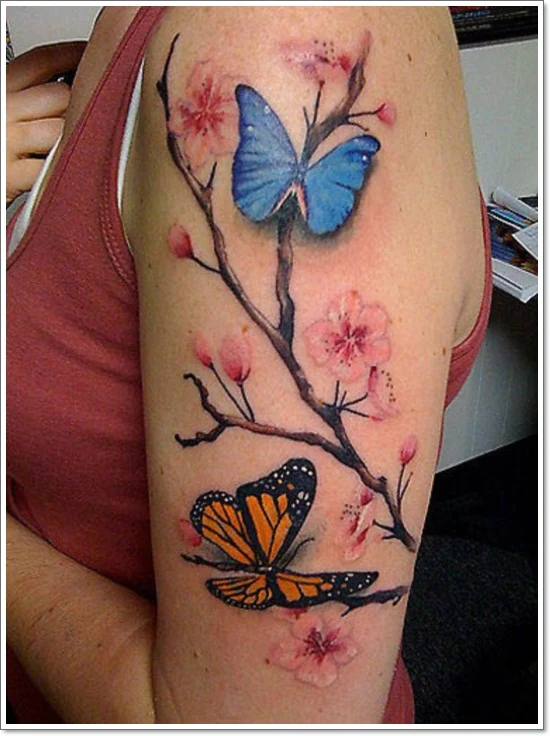 blue tattoo and monarch