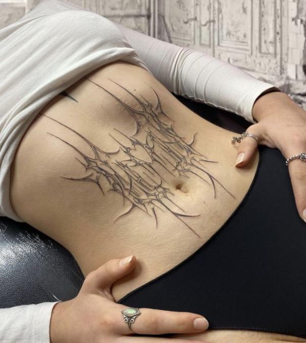 cyber sigilism stomach tattoo