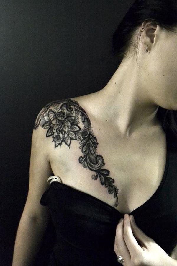 Lace flowers tattoo from shoulder to clavicle