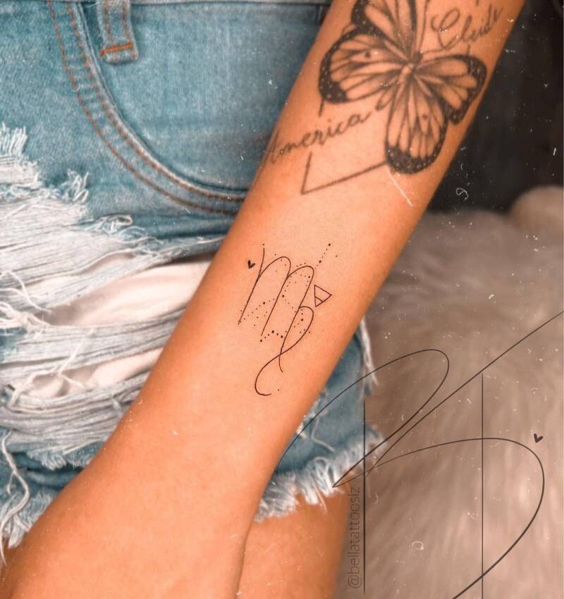 Virgo zodiac symbol and constellation tattoo on the wrist