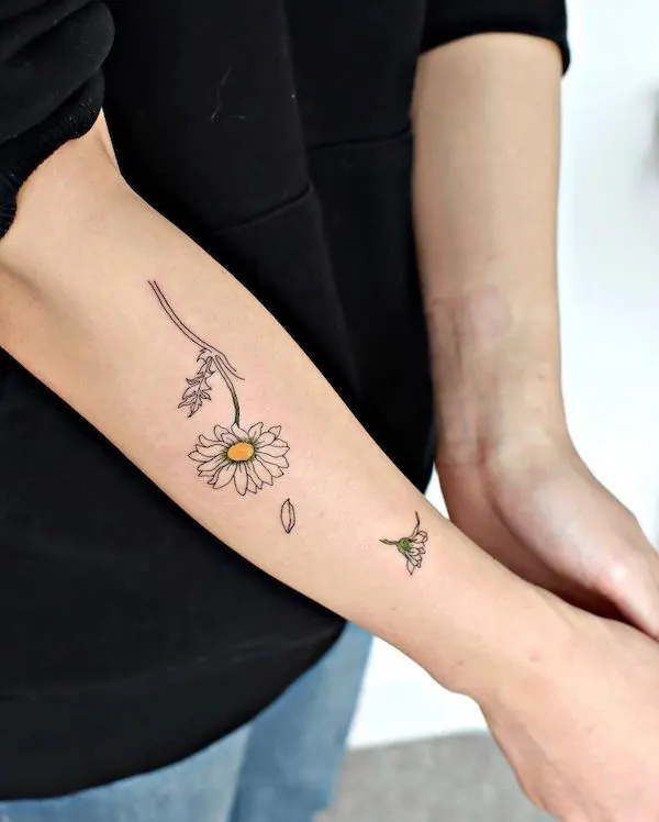 Daisy forearm tattoo by @tattoo.joojoo