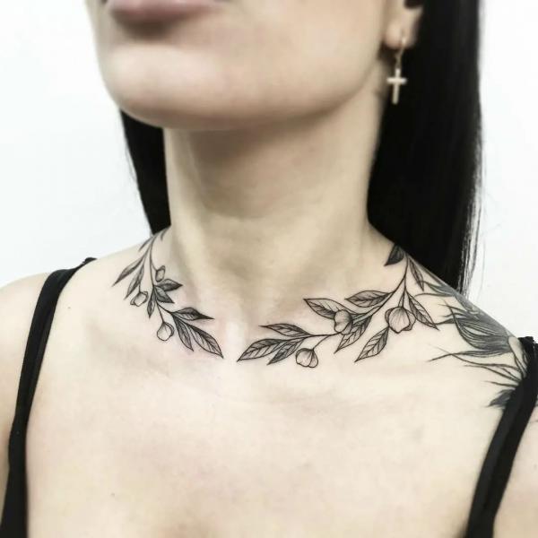 Leaves with floral buds necklace tattoo