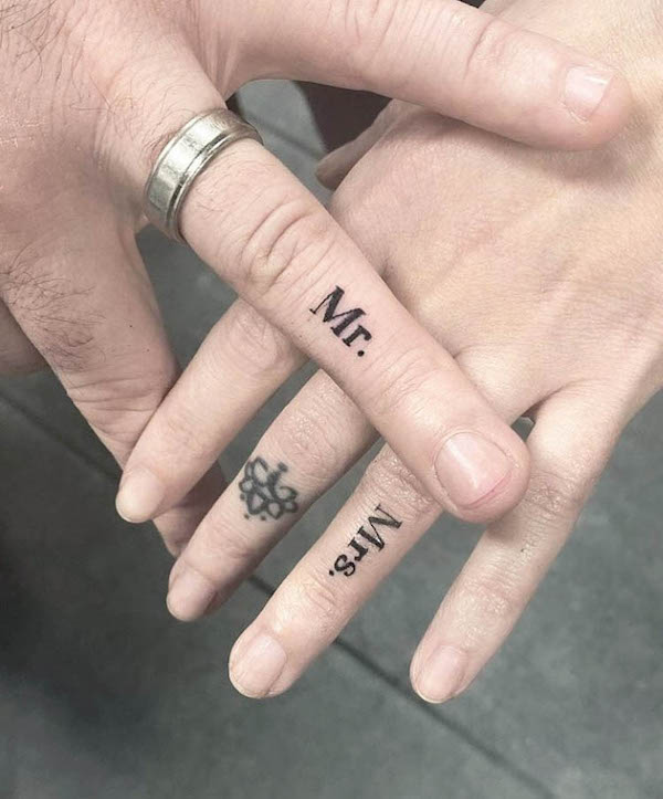 Mr and Mrs wedding ring tattoos by @hontattoostudio