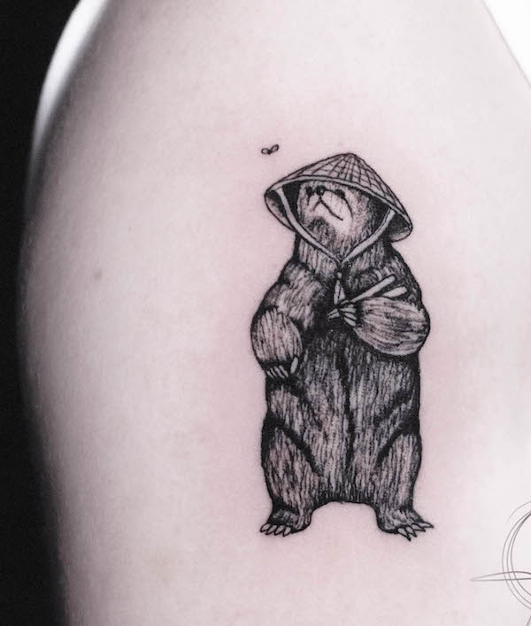 Grizzly bear with a hat by @gata.tattoo