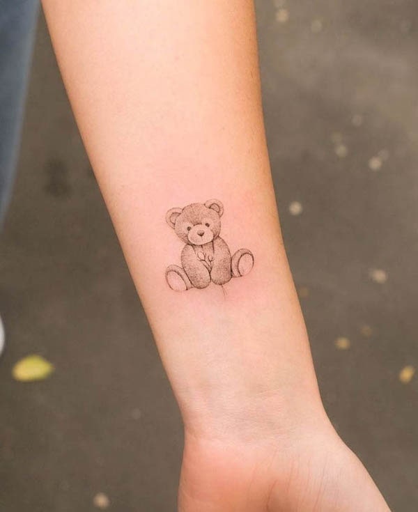 Small teddy bear wrist tattoo by @stefano__mazza