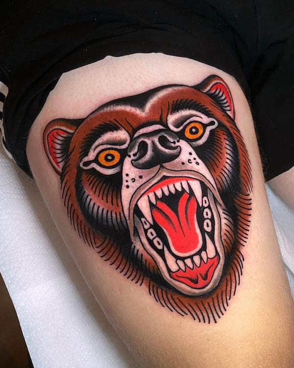 Traditional bear thigh tattoo by @ninja.v.jerr