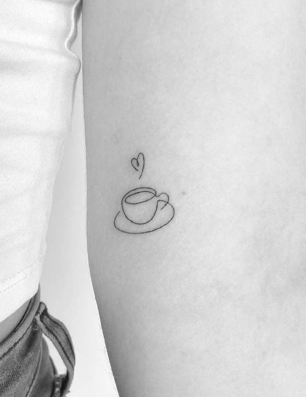 Tiny fine line coffee tattoo by @mrs.tattoo