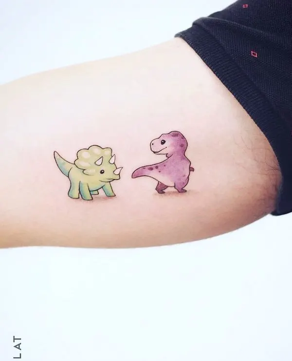 Small cartoon Triceratops and T-rex tattoo by @juan_blat_tatuajes