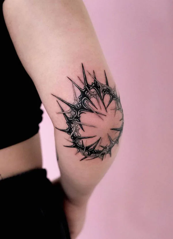 Spikes elbow tattoo by @__danykim